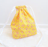 Sunshine yellow with white flowers print cotton drawstring bag or knitting project bag.