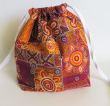 Orange Australian aboriginal art print cotton drawstring bag or knitting project bag.