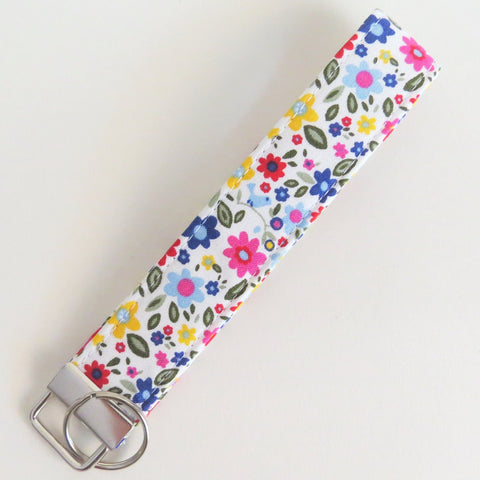 Colorful flowers and a little birdie key fob